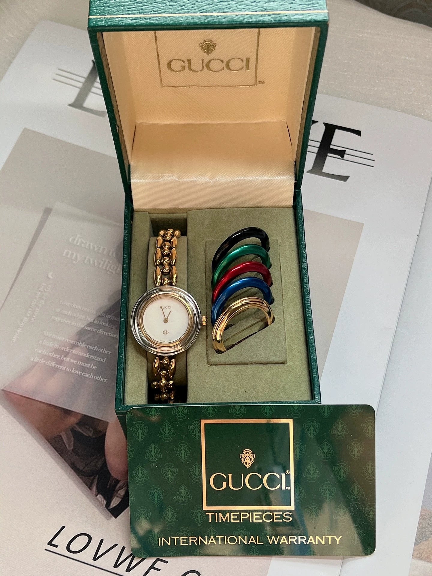 Jun25-bag-43 Auth Gucci Change Bezel 12 Colors Gold Dial Watch