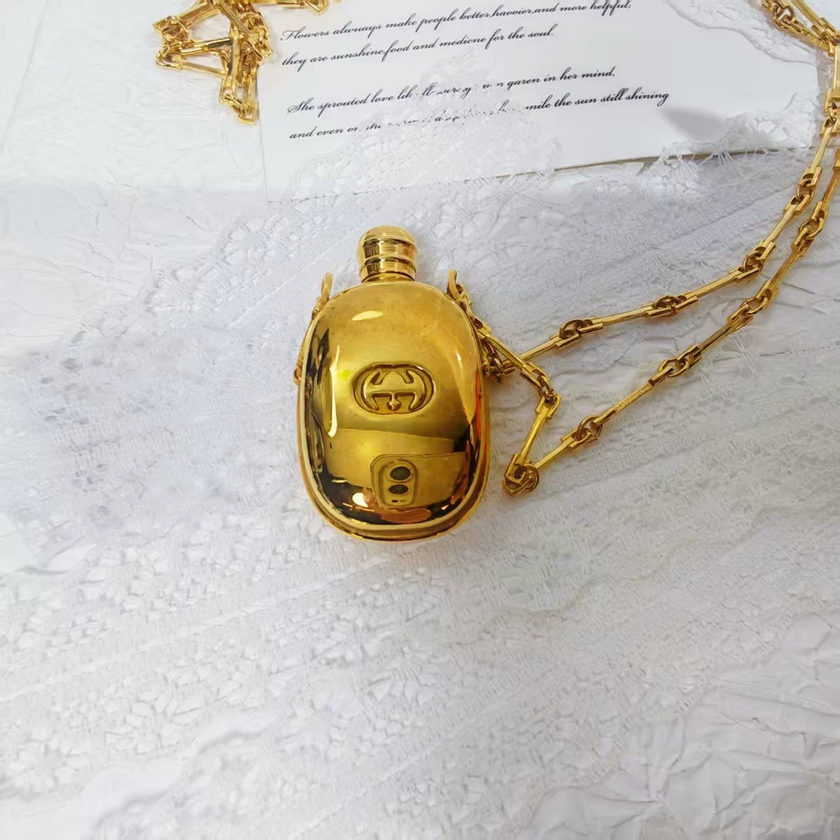 020926-507 Gucci bottle long necklace Perfume
