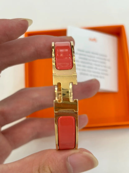 071024-20 Hermes orange enamel gold bracelet Clic HH (GM)