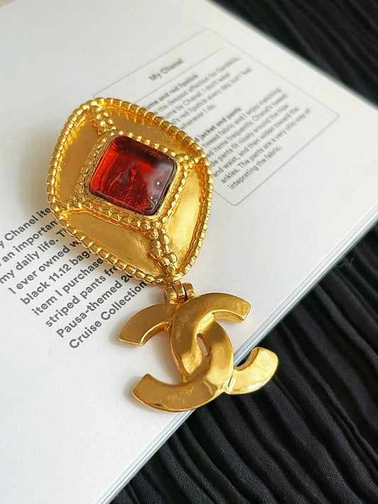 100625-42 Chanel CC gold tone earrings