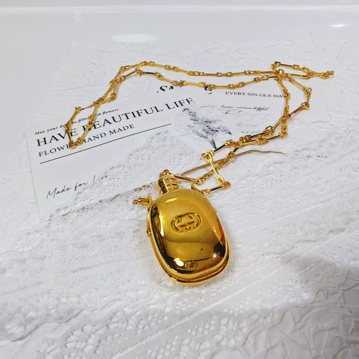 020926-507 Gucci bottle long necklace Perfume