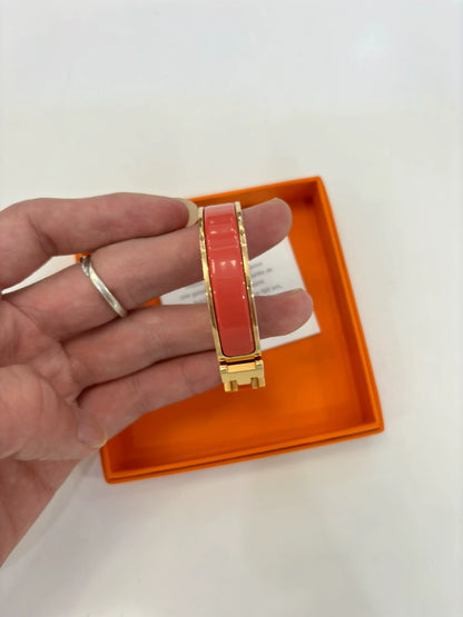 071024-20 Hermes orange enamel gold bracelet Clic HH (GM)