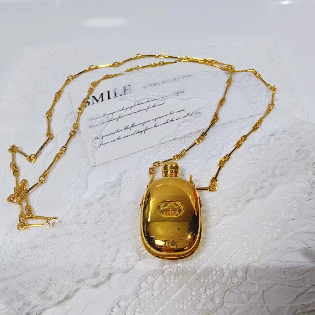 020926-507 Gucci bottle long necklace Perfume