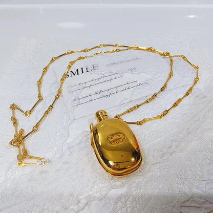 020926-507 Gucci bottle long necklace Perfume