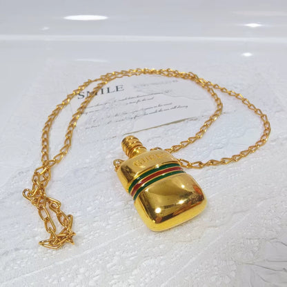 020926-354 Gucci bottle necklace gold Perfume