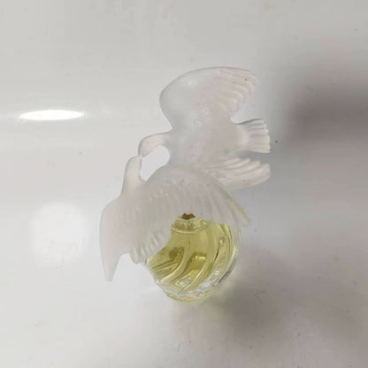020926-360 Nina Ricci fly together