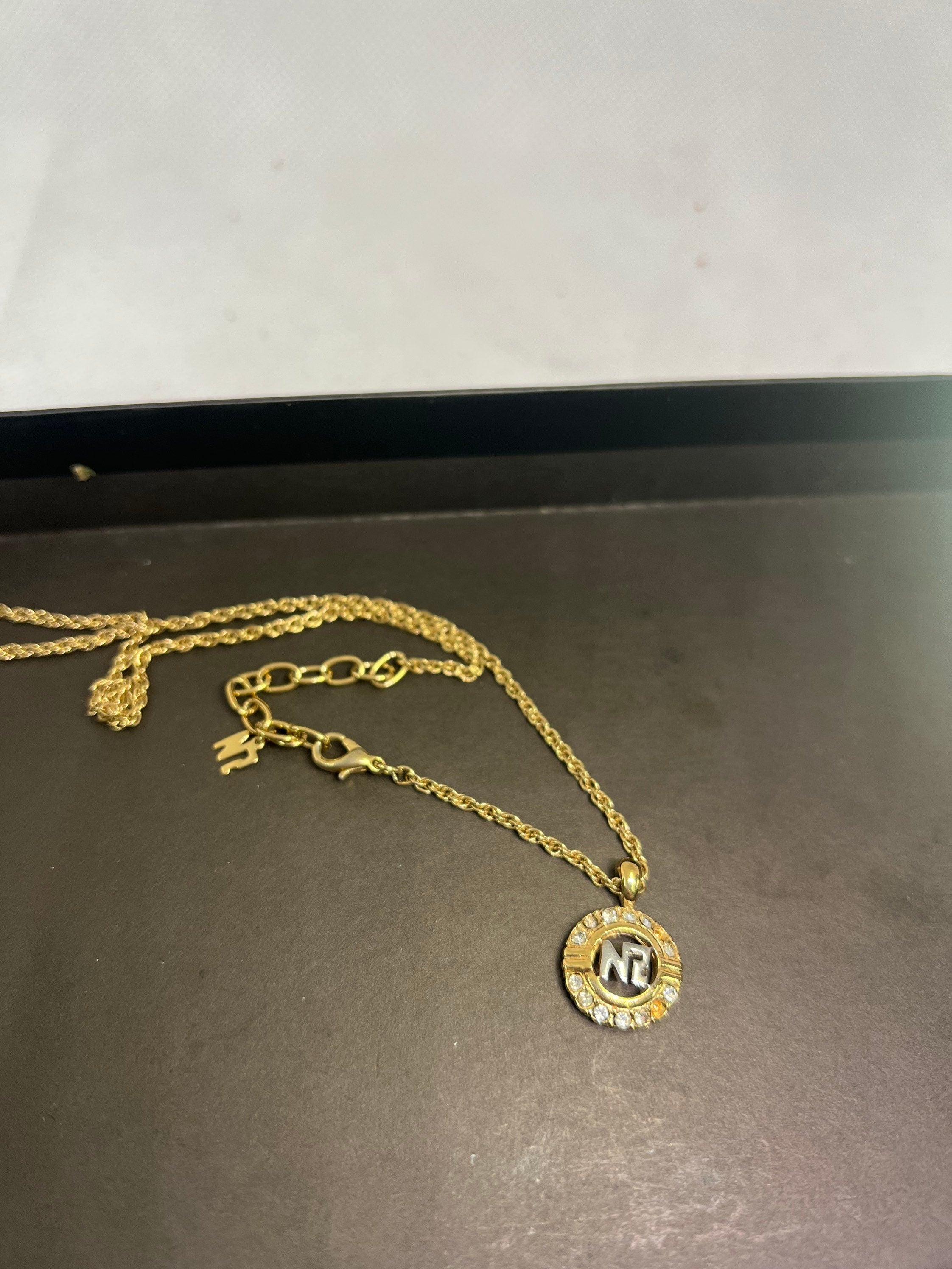 Nina ricci necklace gold on sale price